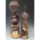 Two Songye Nkisi Power figures or Fetishes, the largest measures 61cm overall height. All lots in