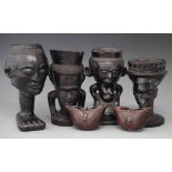 Four anthropomorphic cups, also two palm wine cups, (6) 21cm high All lots in this Tribal and