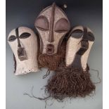 Three Songye kifwebe masks, the largest measures 42cm high. All lots in this Tribal and African