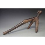 Lobi Daaka three legged stool, carved with three faces, 65cm long All lots in this Tribal and