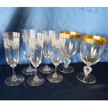 A Pair of Large Wine Glasses having gilt rims on round bases,