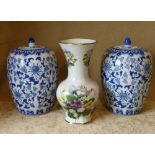 A Pair of Reproduction Blue and White Bulbous Shape Lidded Vases having leaf and scroll decoration,