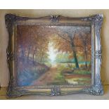 P Duclos Oil on Canvas depicting country path in woodland, signed in gilt frame,