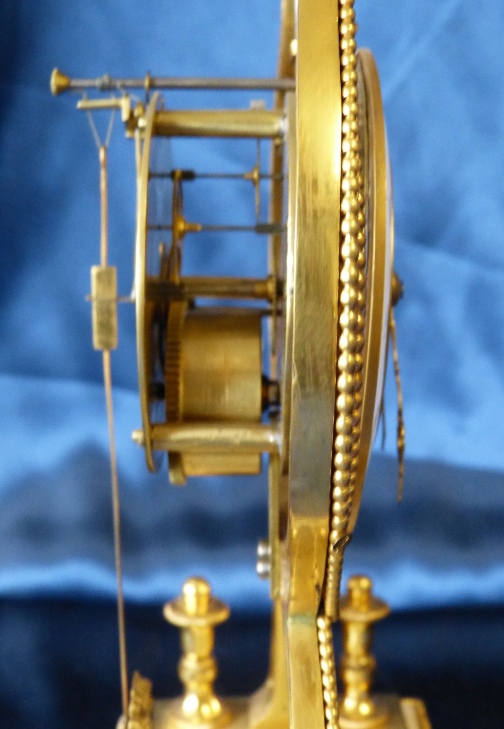 A 19th Century French Directoire Ormolu Lyer Shape Timepiece having white enamel dial, - Image 4 of 7