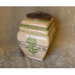 An Ashtead Pottery Square Bulbous Shape Biscuit Barrel having wooden cover on cream and green