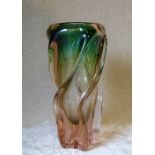 A Twist Glass Fluted Vase on Pink and Green Ground,