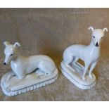 2 white China Figures of Seated Dogs,