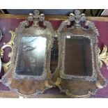 A pair of Georgian design wall mirrors, the rectangular mirror plate set in a walnut and gilt frame,
