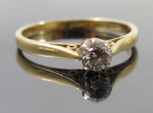 A diamond single stone 18ct gold ring, the brilliant cut of approximately 0.