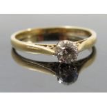 A diamond single stone 18ct gold ring, the brilliant cut of approximately 0.