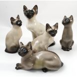 Three Winstanley models, of Siamese cats,