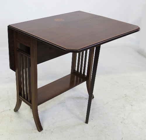 An Edwardian mahogany Sutherland table, with central inlay to the top,