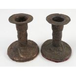 A pair of metal short candlesticks, embossed with dragons, height 3.