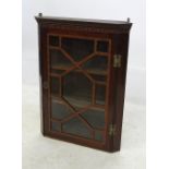 A small 19th century corner cupboard, with satinwood and bone inlay,