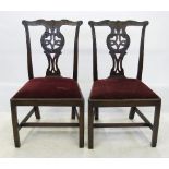 A pair of Georgian mahogany Chippendale design single chairs,