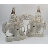 A pair of 19th century Staffordshire flat back figures, of Scottish people on horseback,