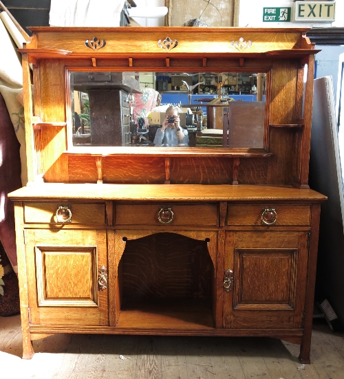 An Arts and Crafts oak sideboard, by Shapland and Petter,