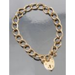 A 9ct gold bracelet, of curb links, to a padlock clasp with a safety chain, weight 13.