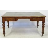 A 19th century mahogany writing table, fitted two drawers to each side below a leathered top,