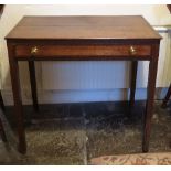 A Georgian oak side table, fitted with a cross banded frieze drawer, raised on square legs,