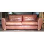 A Heals brown leather sofa