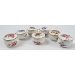 Five Royal Worcester circular covered boxes, hand painted with flowers, one signed,