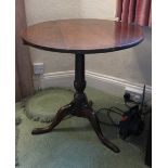 A 19th century circular oak occasional table,