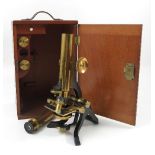 A late 19th century brass microscope,