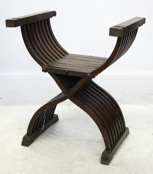 A slatted folding cross frame chair