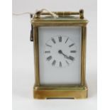 A 19th century gilt metal carriage clock, the striking movement stamped E M & Co for E Maurice & Co,