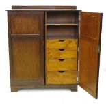 A gentleman's fitted mahogany compactum, with two panelled doors opening to reveal hanging space,