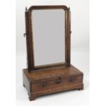 A 19th century mahogany dressing table mirror, the rectangular glass plate with gilt inner frame,