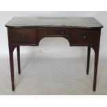 A 19th century mahogany concave front dressing table, fitted with a drawer to the kneehole,