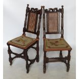 A set of six 17th century style oak dining chairs, with high panelled back,