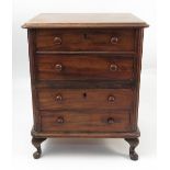 A 19th century miniature mahogany chest of drawers, fitted with four graduated long drawers,