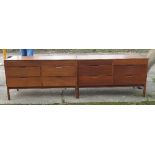 A pair of Scandinavian style units, each fitted with two banks of three graduated drawers, width 48.