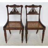 A pair of rosewood Regency style chairs, with lyre shaped splats,