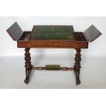 A 19th century rosewood writing table,