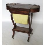 A 19th century rosewood work table, the reversible central top with writing surface to one side,