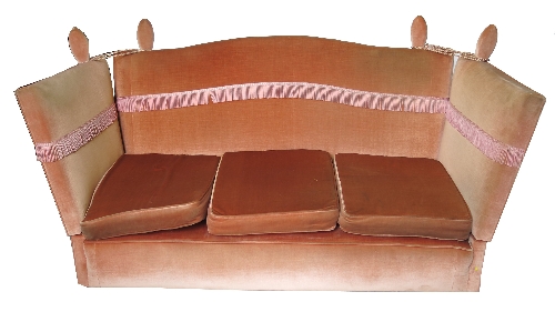A Knoll style drop end sofa, in pink upholstery,