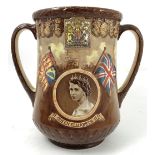 A Royal Doulton commemorative loving mug,