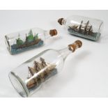 A collection of model ships in bottles