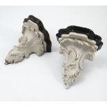 A pair of 19th century marble and stained wood wall brackets,