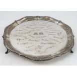 A silver salver, the ogee border with ribbed and cross decoration to harebells,