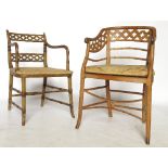 A simulated bamboo painted armchair, with lattice back, together with another similar chair,