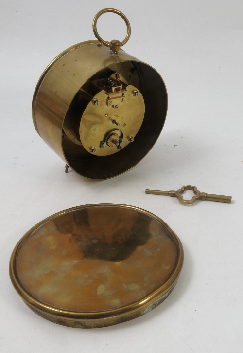A circular brass cased clock, the white enamel dial with Roman numerals with circular case, - Image 2 of 3