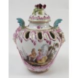 A Continental pierced covered vase, decorated with Classical figures, baton mark to base, height 4.