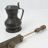 A pewter covered tankard, of baluster form, with London touch marks to base, height 8ins,