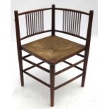 A mahogany corner chair,