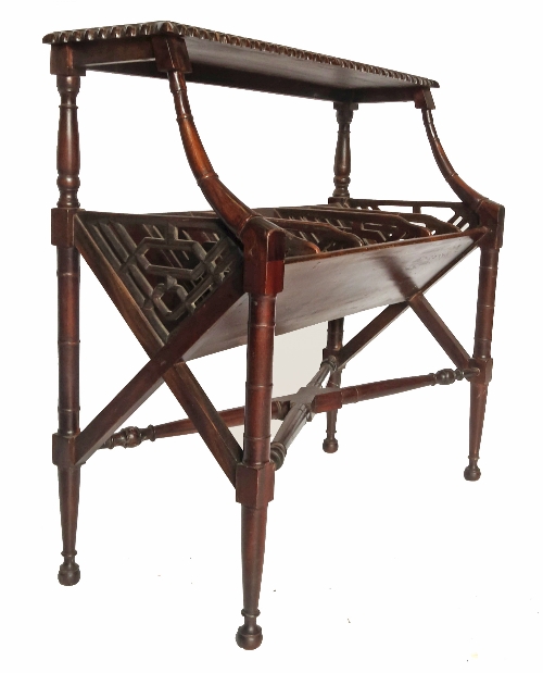 A mahogany bookstand, having a rectangular shelf with gadrooned border,